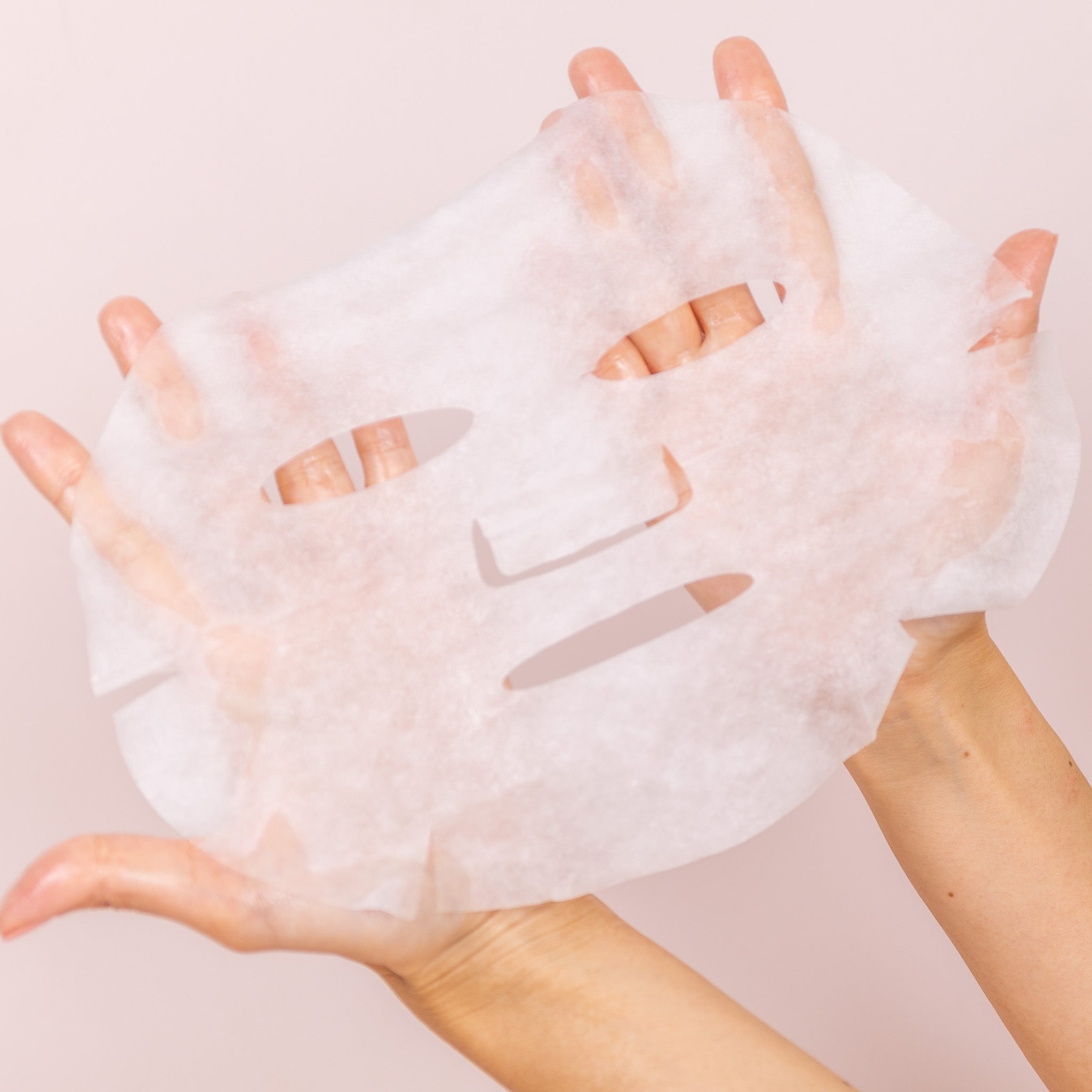 sheet mask lay on hand