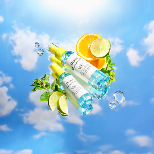 BLUE JASMIN & MINT Dry Shampoo on mirror reflection of sky