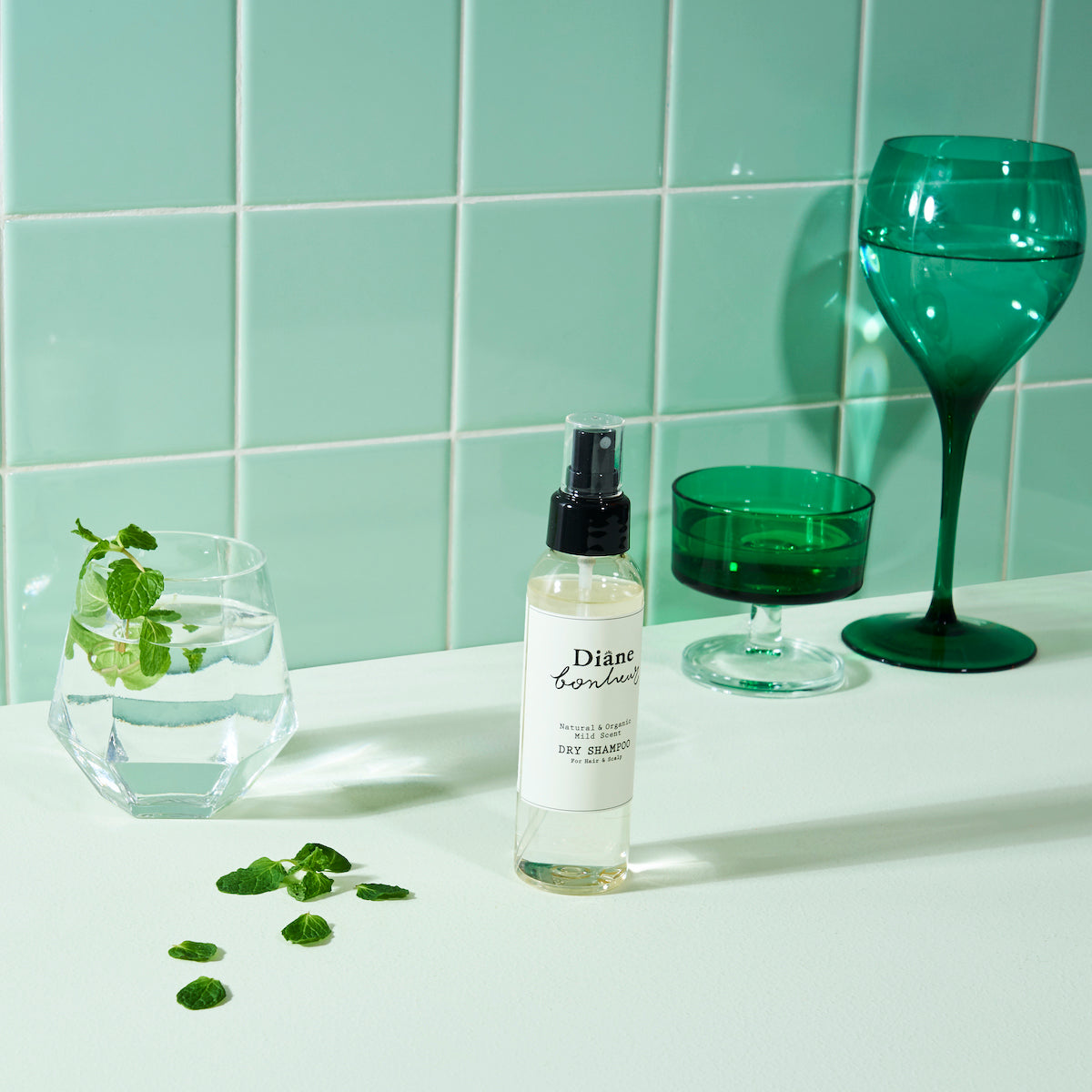 MILD SUBTLE SCENT Dry Shampoo on green bathroom setting