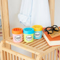Load image into Gallery viewer, LAVONS Car Fragrance Gel series on clothing rack
